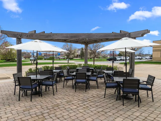 an aerial view of a house with a ocean view