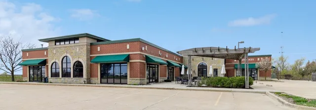 front view of a building with a street