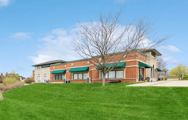 a view of a yard in front of a house