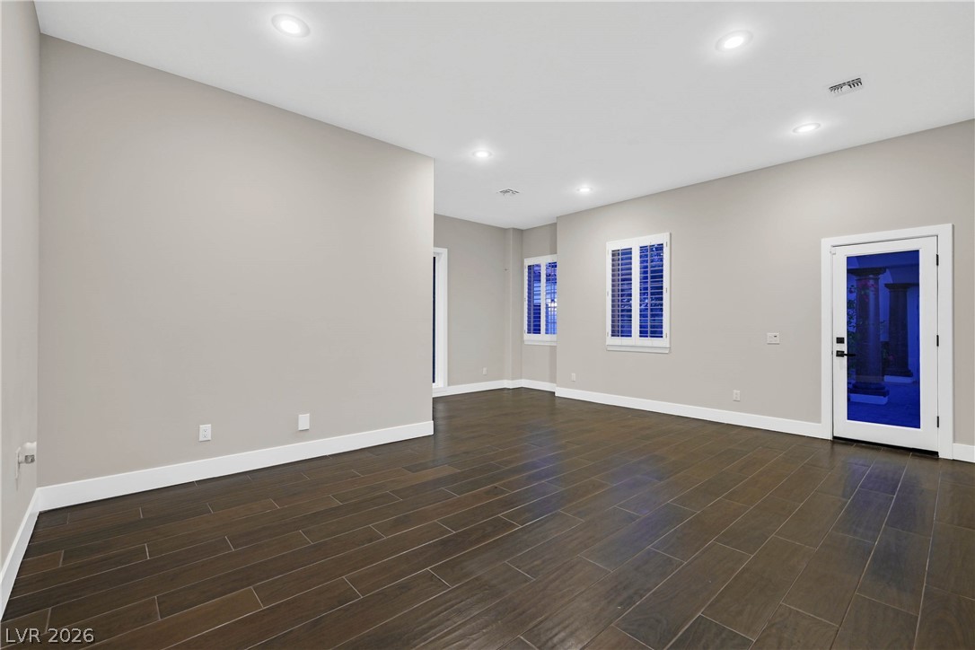 6 Rue Du Ville Henderson, NV 89011 - Photo 50 of 99 This expansive living area features elegant flooring and abundant natural light.