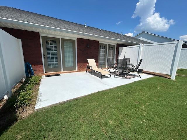 115 Old Mill Drive Calhoun, GA 30701 - Photo 20 of 28 a front view of a house with sitting area and garden