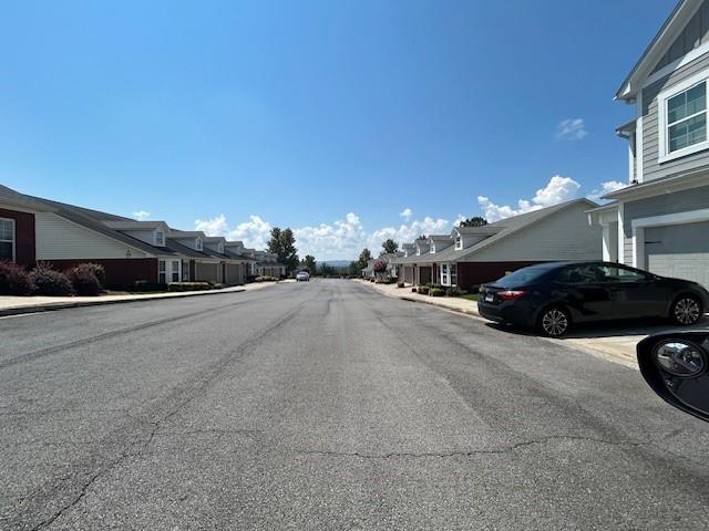 115 Old Mill Drive Calhoun, GA 30701 - Photo 4 of 28 a view of street with parked cars