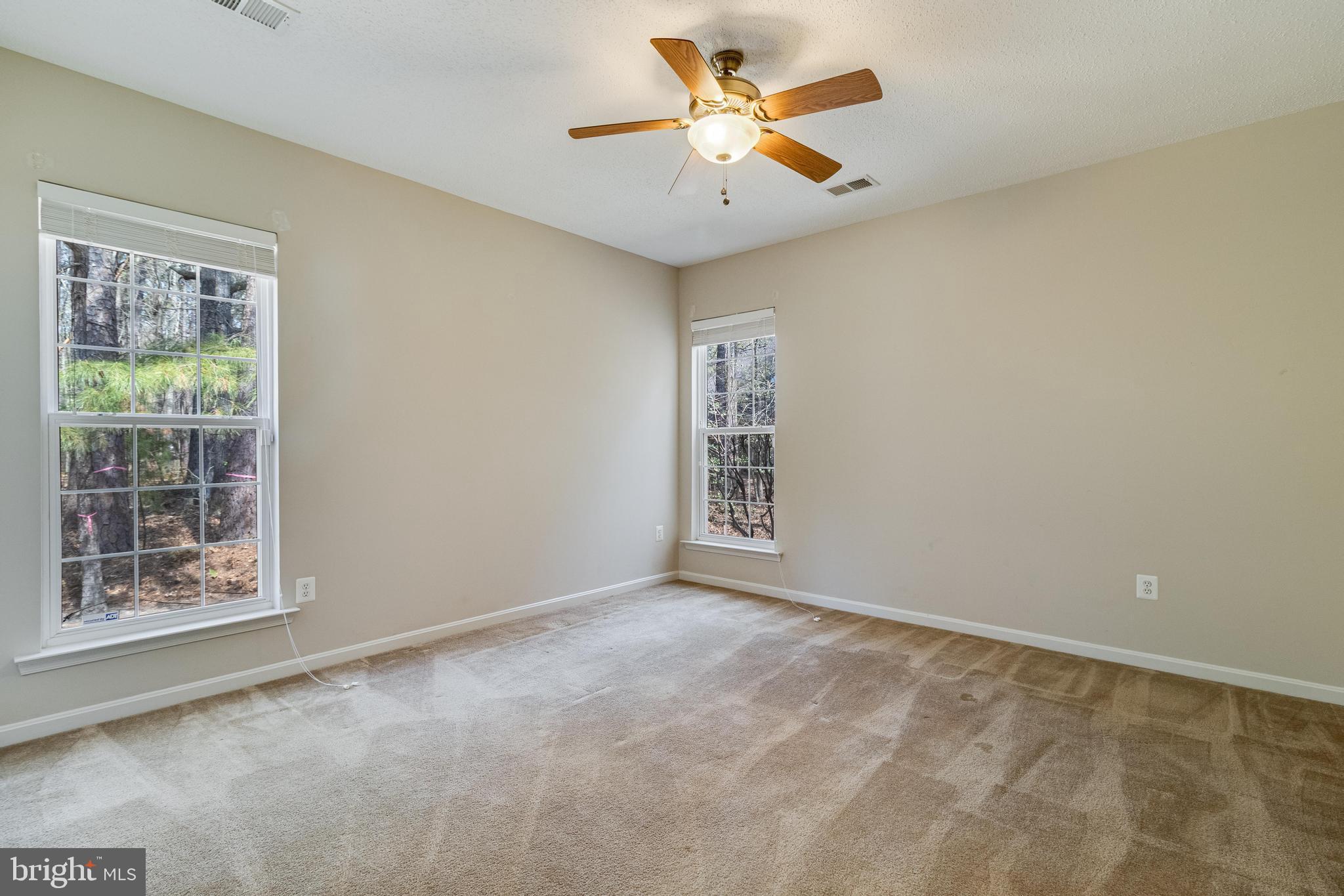 14850 King Charles Drive Issue, MD 20645 - Photo 13 of 63 a view of an empty room with a window