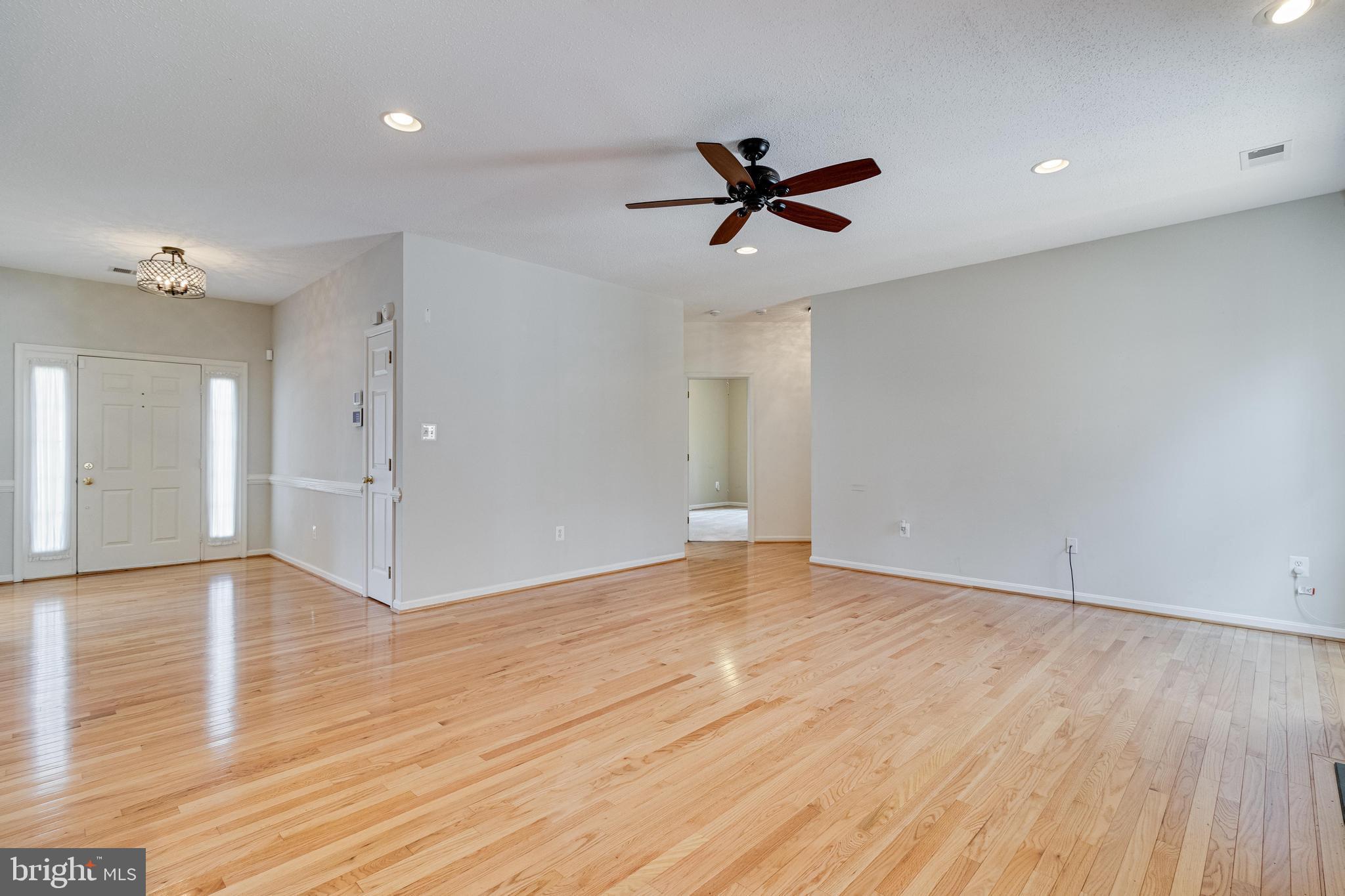 14850 King Charles Drive Issue, MD 20645 - Photo 20 of 63 a view of an empty room and wooden floor