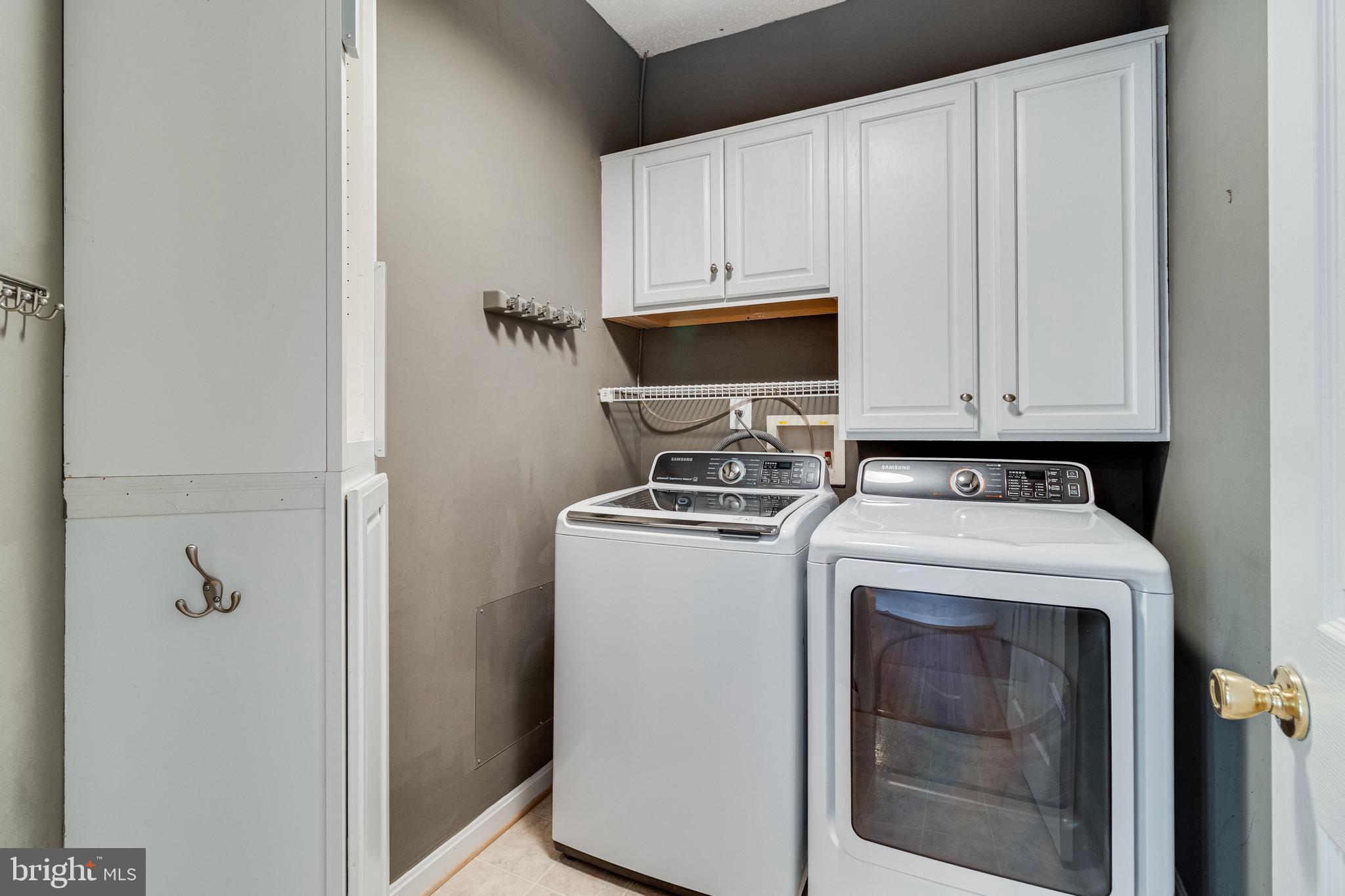 14850 King Charles Drive Issue, MD 20645 - Photo 26 of 63 a utility room with dryer and washer