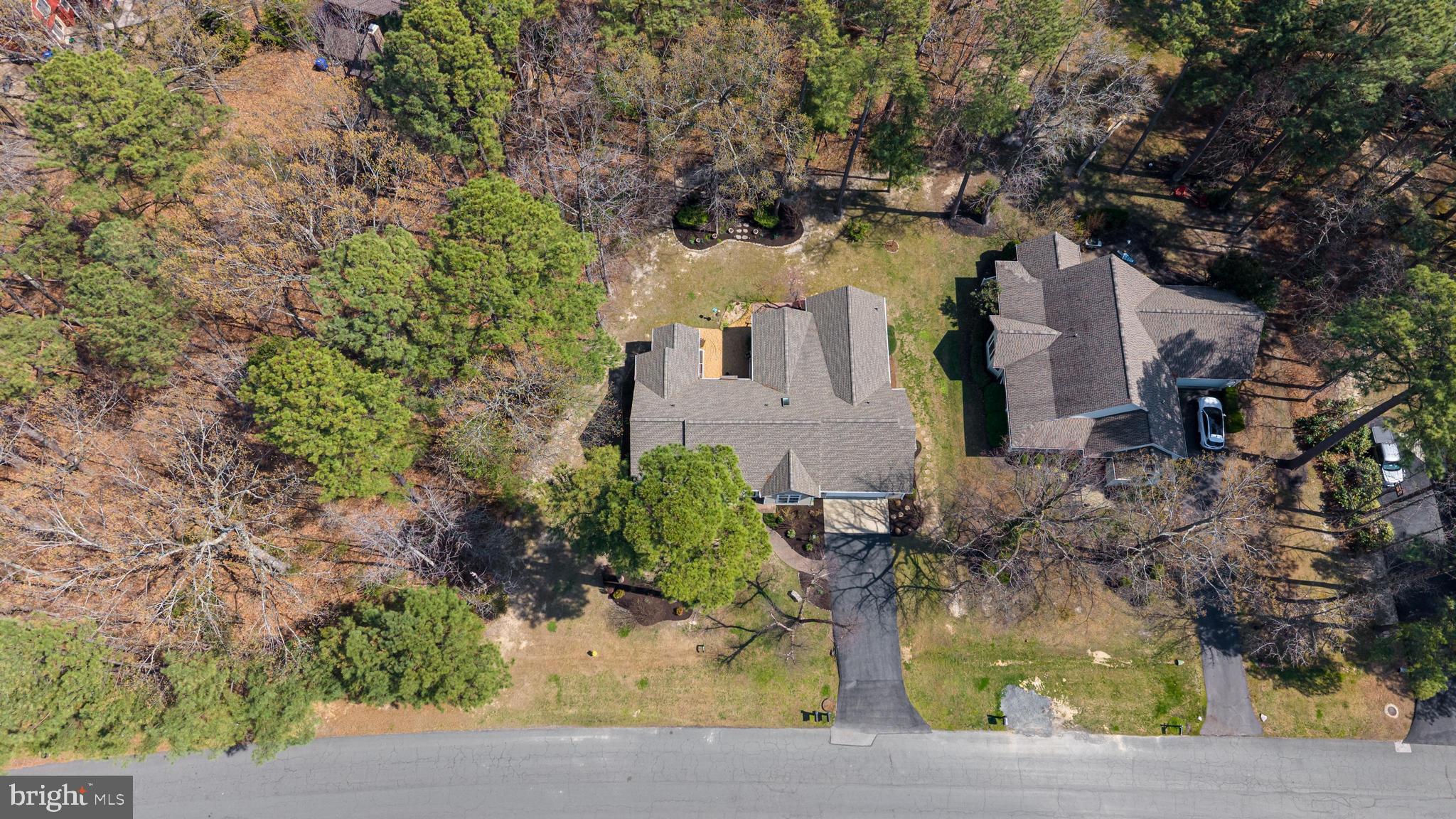 14850 King Charles Drive Issue, MD 20645 - Photo 42 of 63 an aerial view of a house with a yard