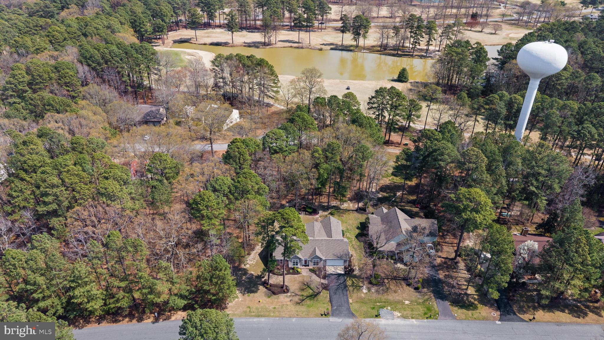 14850 King Charles Drive Issue, MD 20645 - Photo 43 of 63 a view of a lake with a house