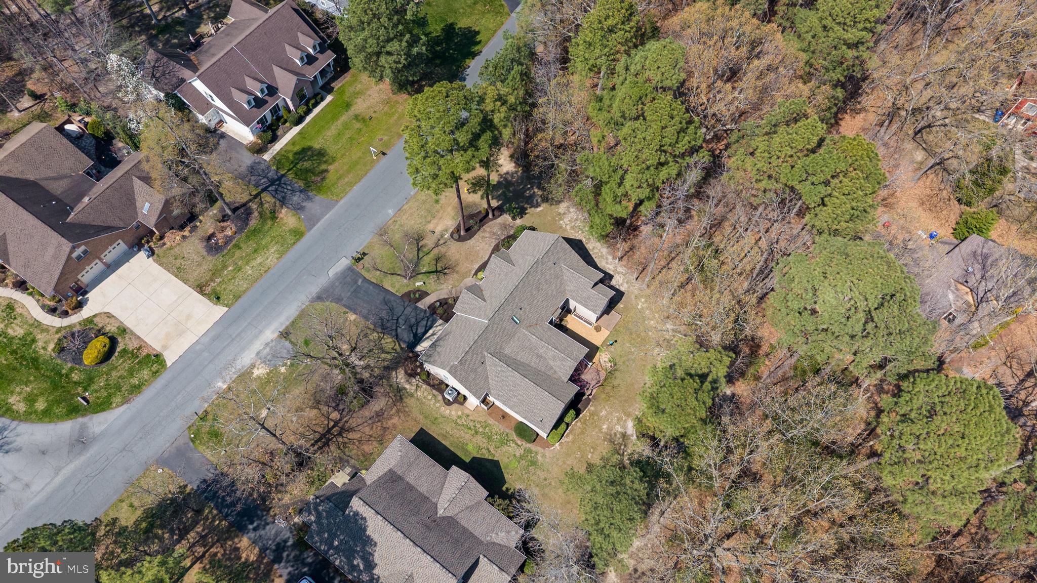 14850 King Charles Drive Issue, MD 20645 - Photo 47 of 63 an aerial view of a house with a yard