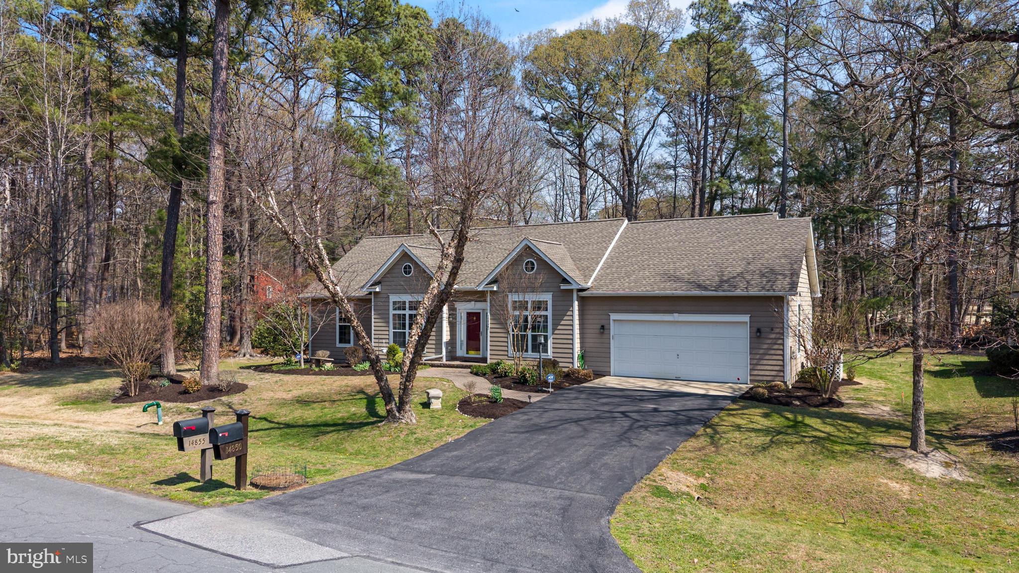 14850 King Charles Drive Issue, MD 20645 - Photo 63 of 63 a front view of a house with garden
