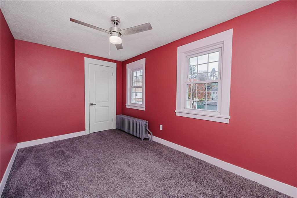 887 Millville Road Altoona, PA 16601 - Photo 17 of 29 an empty room with windows and ceiling fan