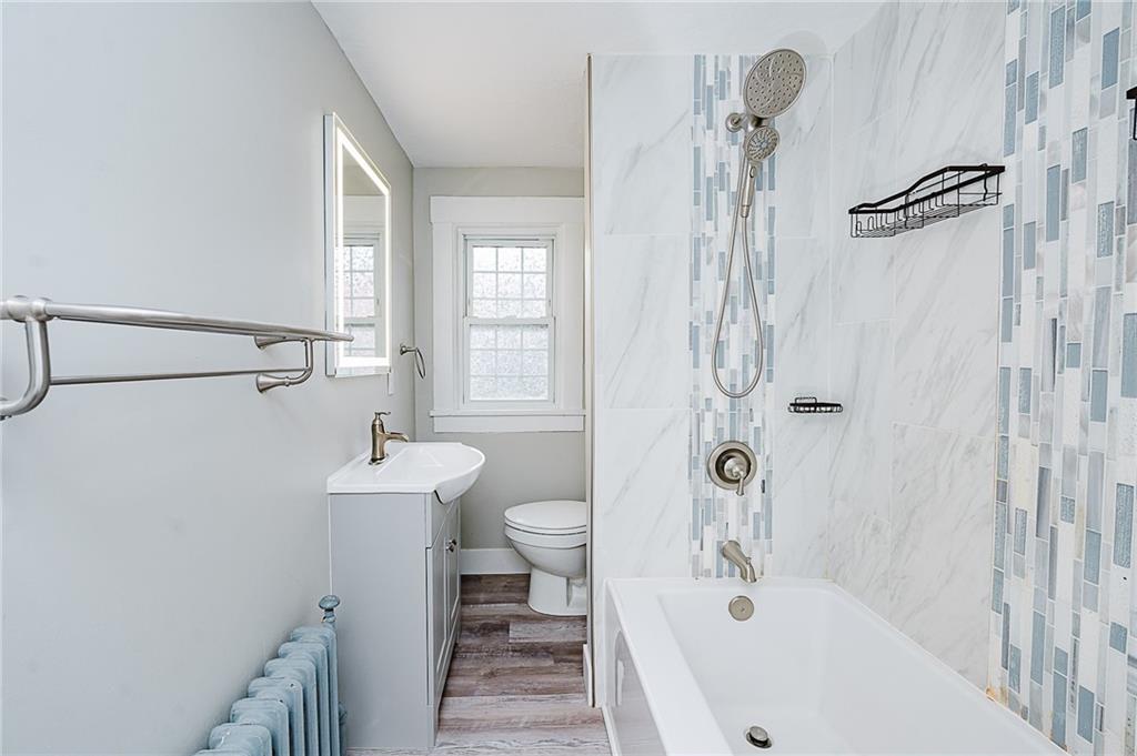 887 Millville Road Altoona, PA 16601 - Photo 22 of 29 a bathroom with a sink a toilet and shower