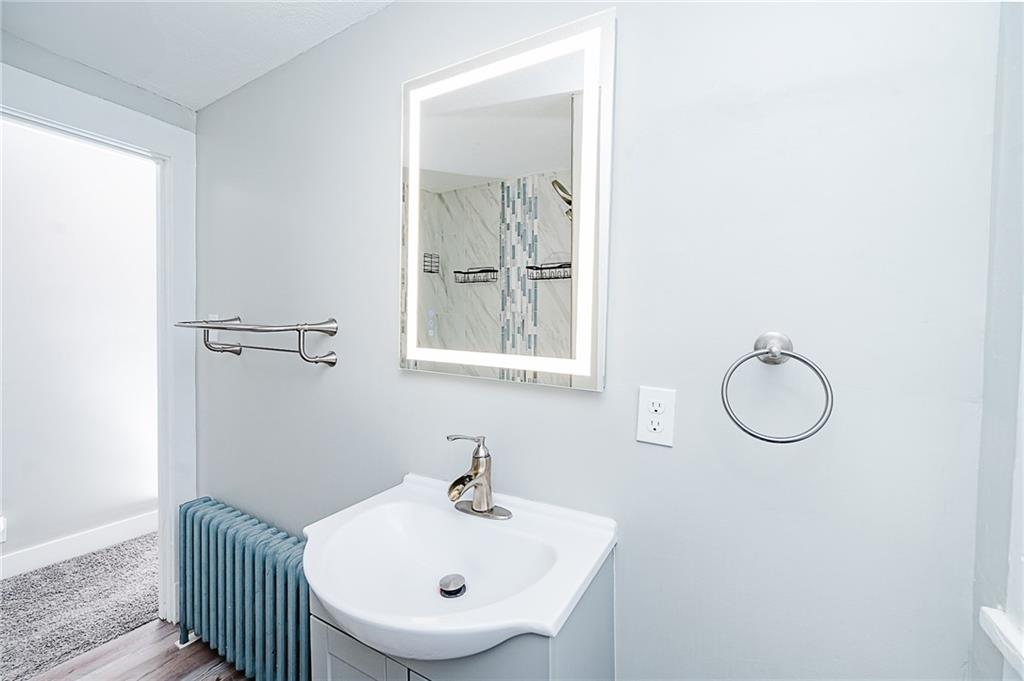 887 Millville Road Altoona, PA 16601 - Photo 24 of 29 a bathroom with a sink and a mirror