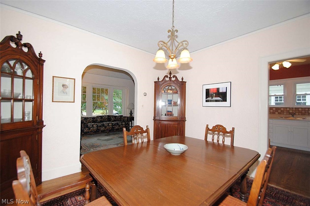 3300 Avalon Road Cleveland, OH 44120 - Photo 6 of 25 FORMAL DINING ROOM WITH BUILT-IN CORNER CABINETS. OPEN TO LIVING ROOM, KITCHEN AND FAMILY ROOM