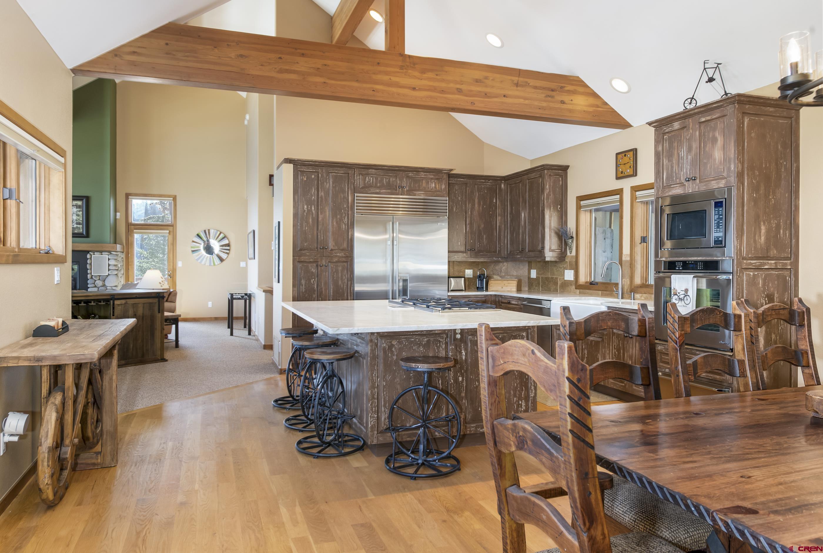 15 Nicholson Lane Crested Butte, CO 81224 - Photo 13 of 42 a dinning table and chairs in the kitchen