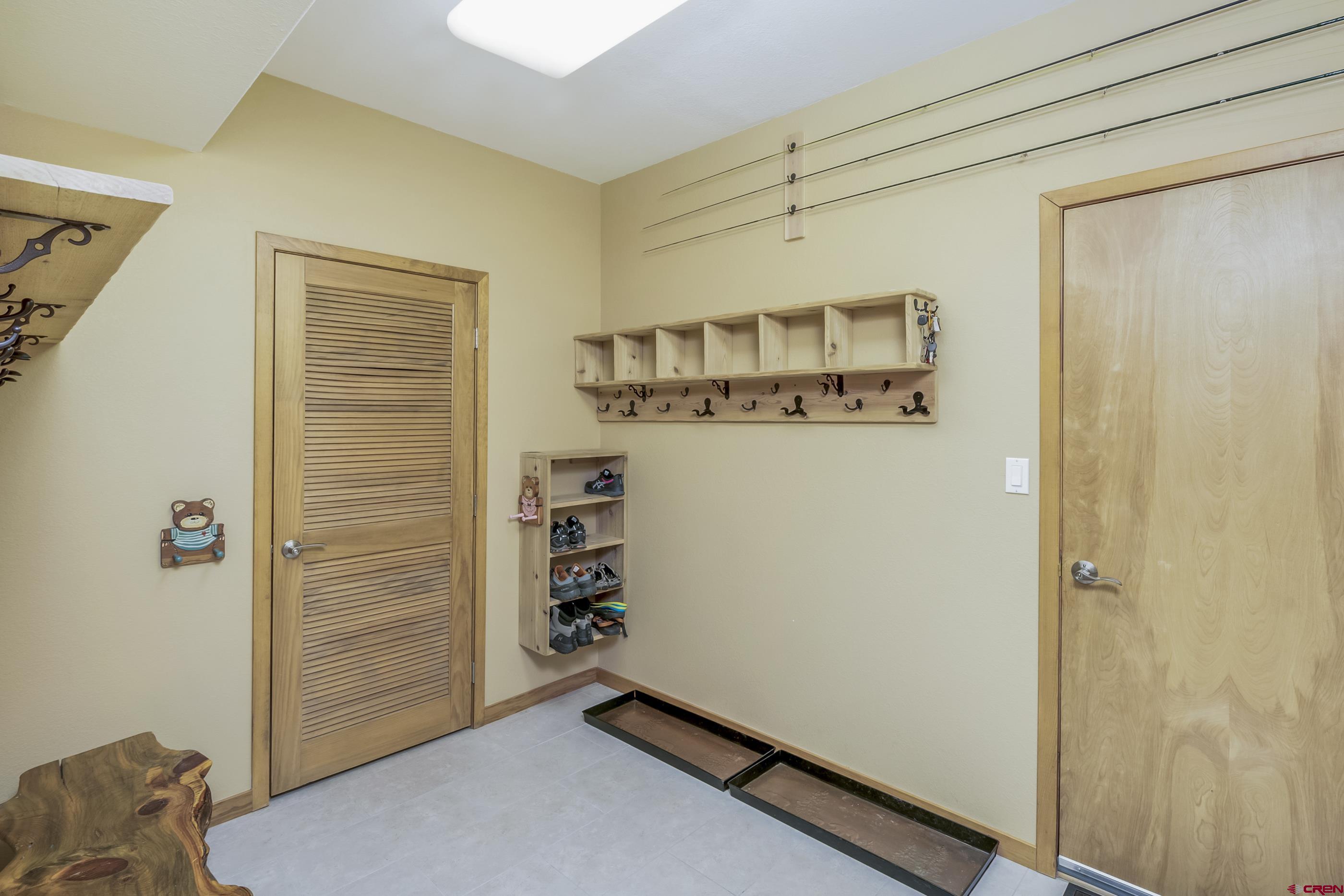 15 Nicholson Lane Crested Butte, CO 81224 - Photo 20 of 42 a view of walk in closet with clothes and shoes