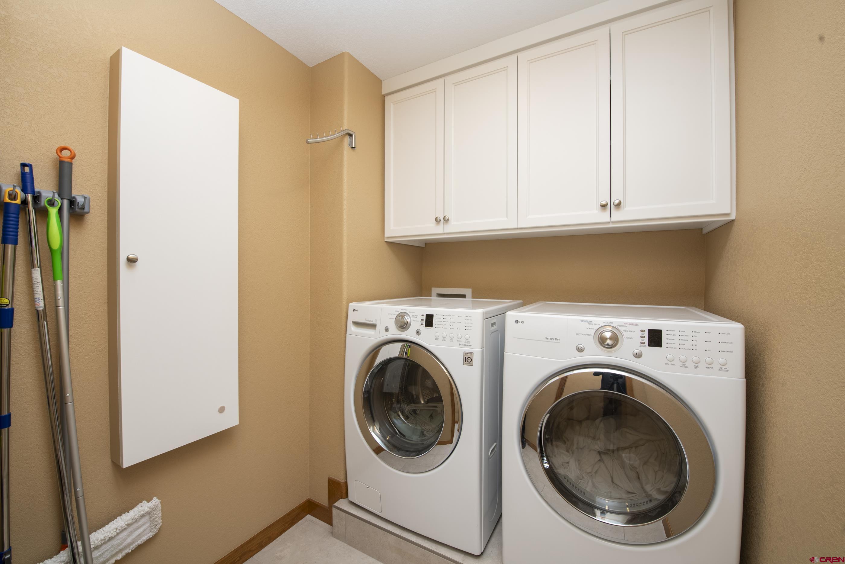 15 Nicholson Lane Crested Butte, CO 81224 - Photo 21 of 42 a utility room with dryer and washer