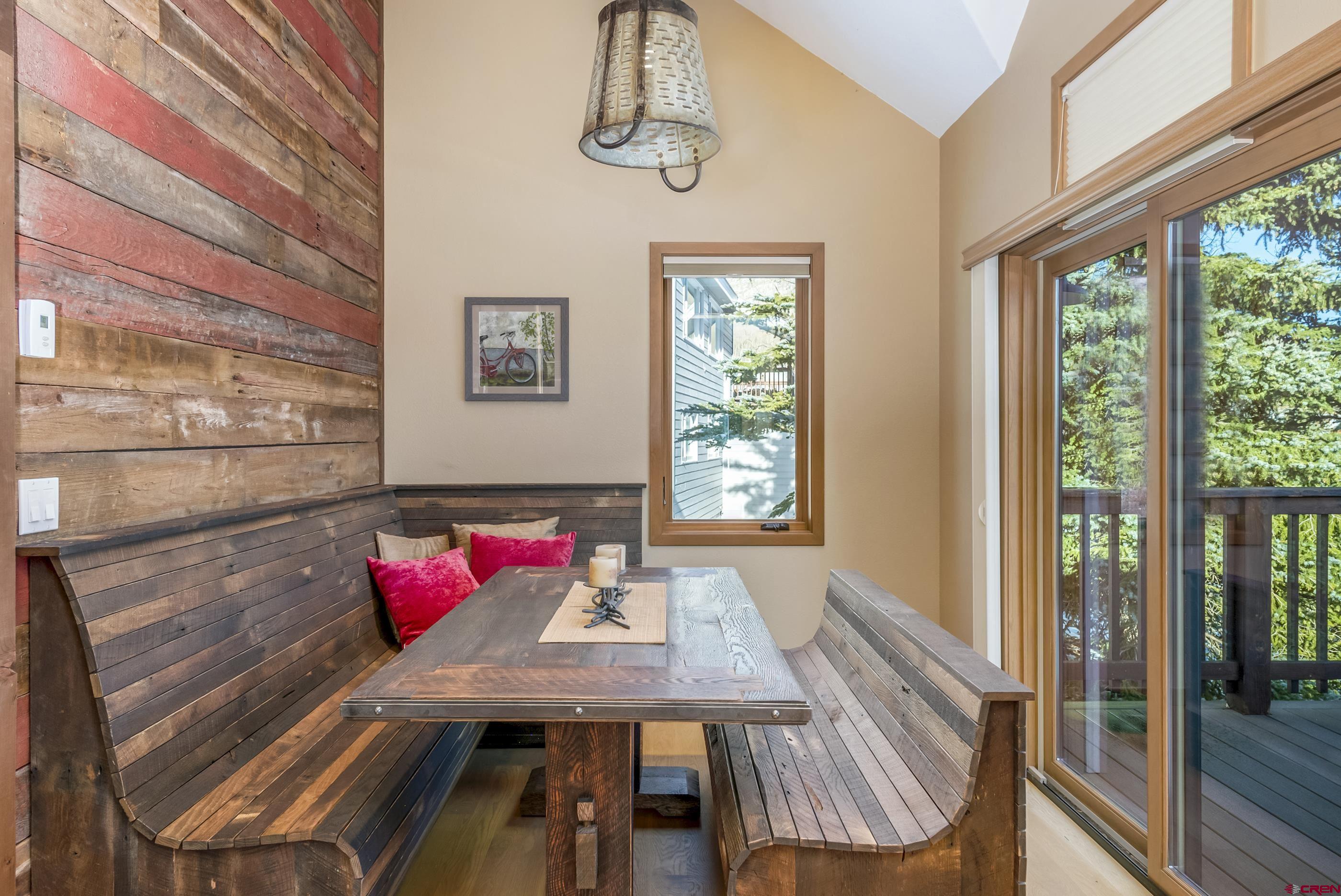 15 Nicholson Lane Crested Butte, CO 81224 - Photo 31 of 42 a view of a dining room with furniture window and outside view