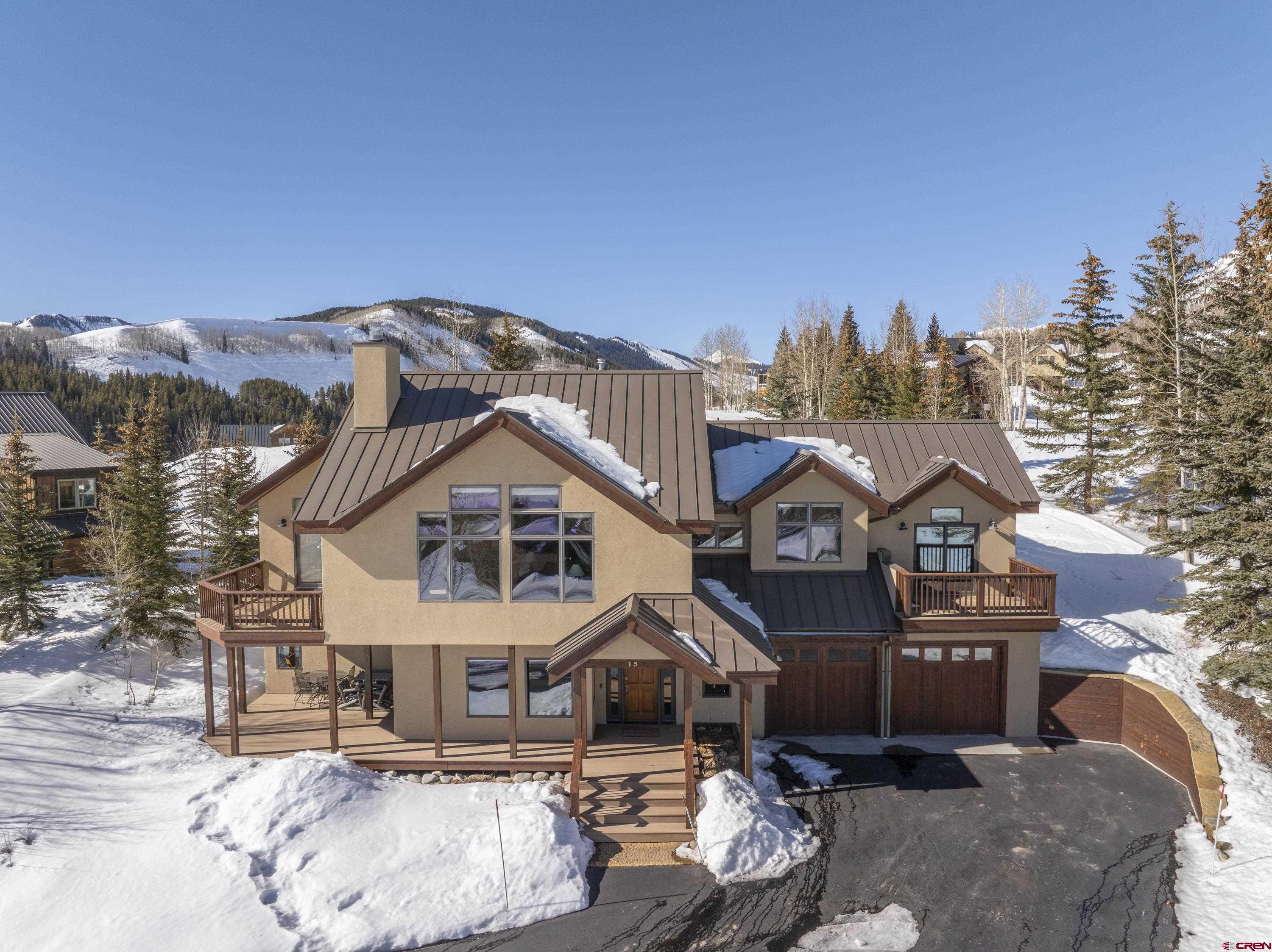 15 Nicholson Lane Crested Butte, CO 81224 - Photo 36 of 42 a front view of a house with a yard