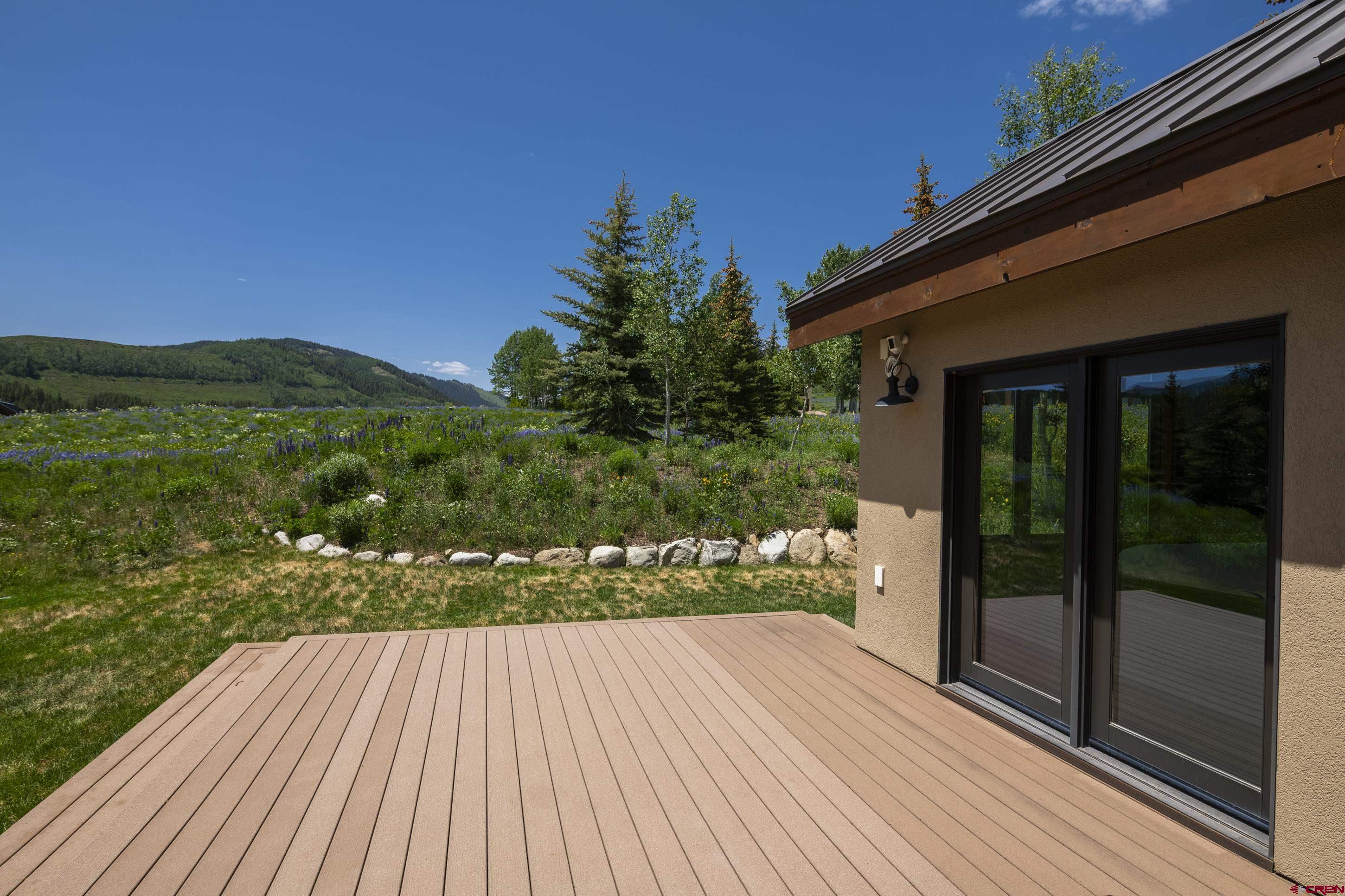 15 Nicholson Lane Crested Butte, CO 81224 - Photo 42 of 42 a view of balcony with wooden floor and outdoor space