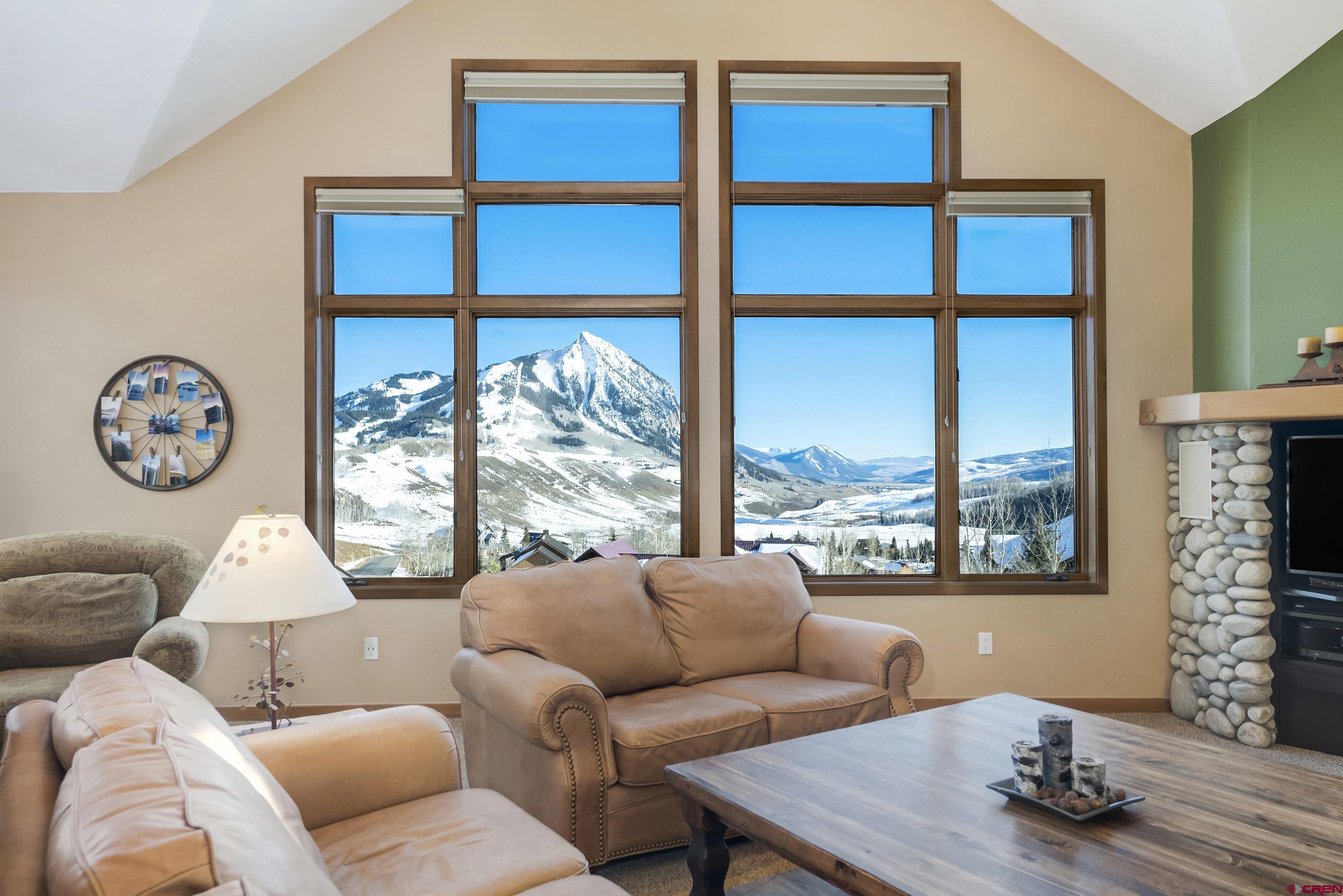 15 Nicholson Lane Crested Butte, CO 81224 - Photo 8 of 42 a living room with furniture and a large window