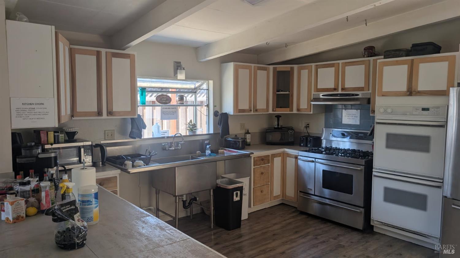 359 Bonnie Avenue Rohnert Park, CA 94928 - Photo 4 of 13 a kitchen with stainless steel appliances granite countertop a stove and a sink