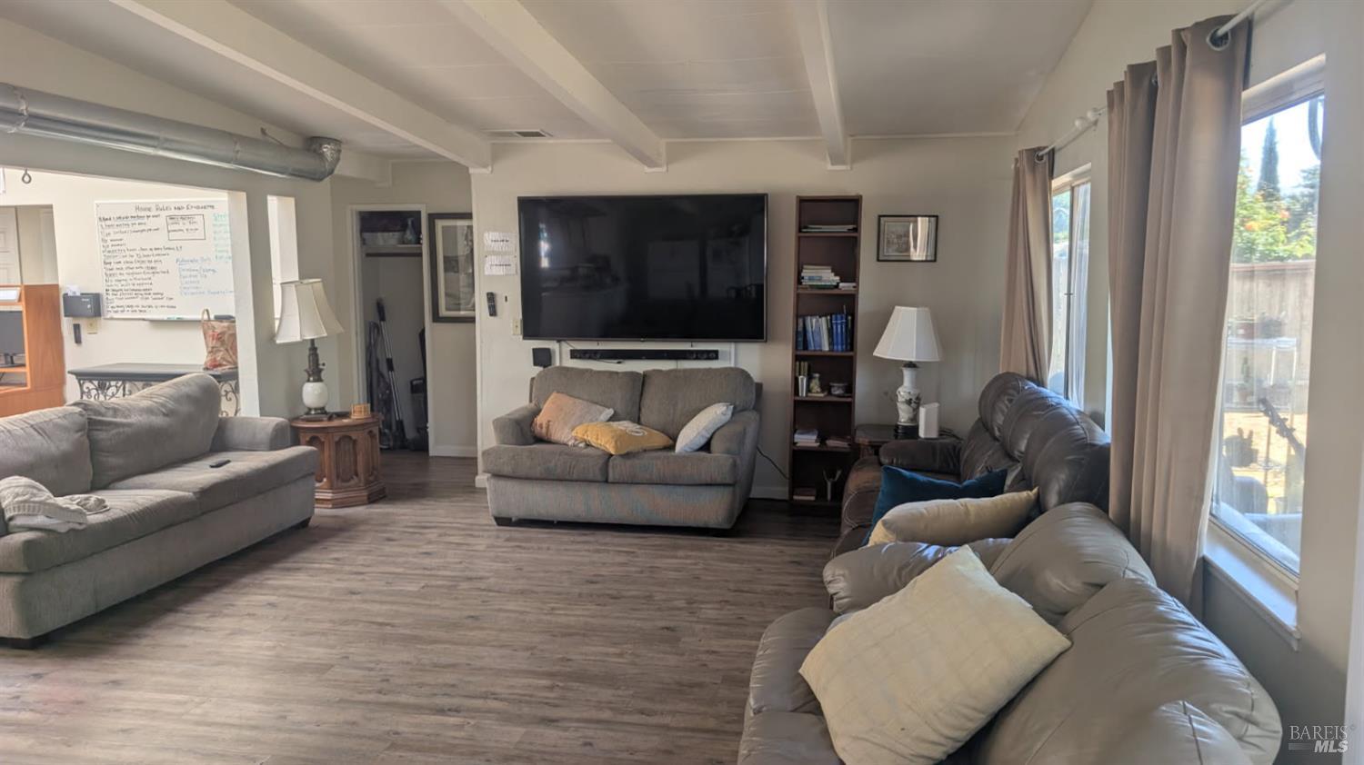 359 Bonnie Avenue Rohnert Park, CA 94928 - Photo 7 of 13 a living room with furniture and a large window
