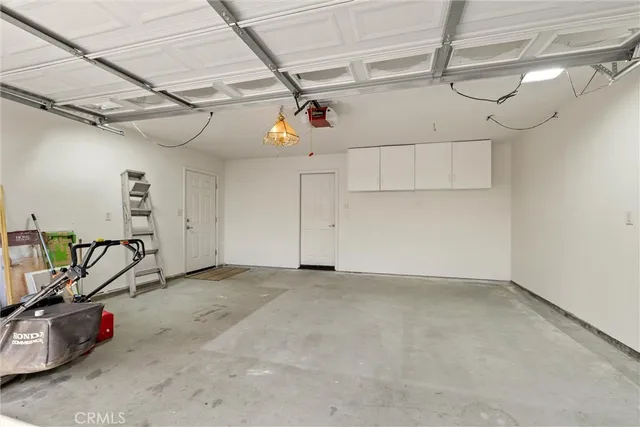 a view of a garage with storage