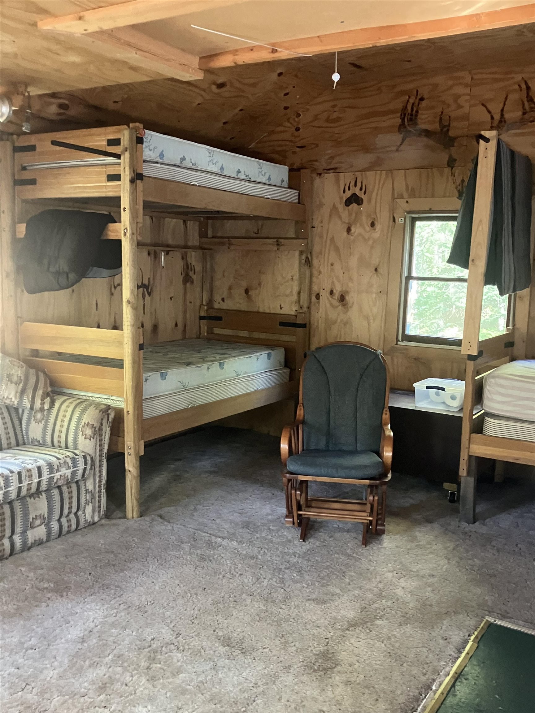 44890 Potato River Road Saxon, WI 54559 - Photo 9 of 16 Bedroom with wood walls