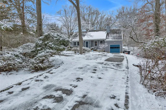 a view of houses with wooden fence