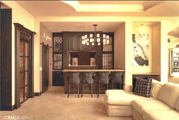 a kitchen with a stove a sink and a refrigerator