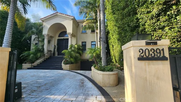 a view of house and garden