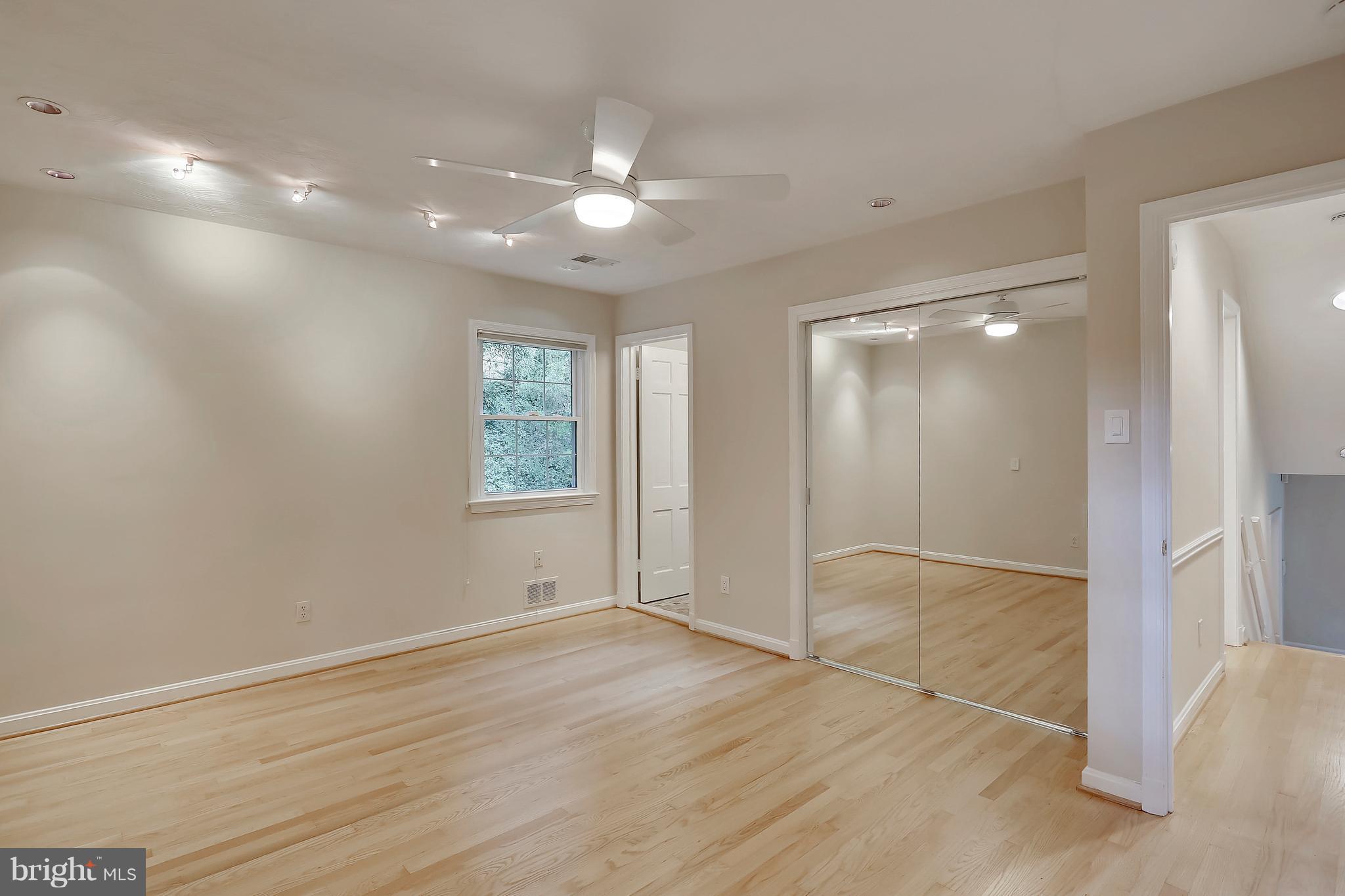 2124 Edgewater Parkway Silver Spring, MD 20903 - Photo 13 of 30 MASTER BR W/HARDWOOD FLRS & MIRRORED DR CLOSET