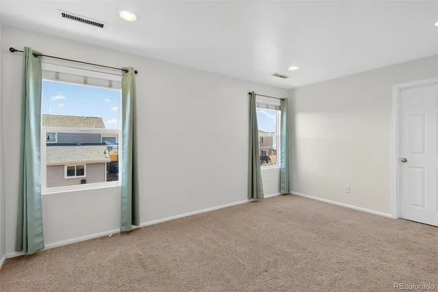 a bathroom with a toilet and a bathtub