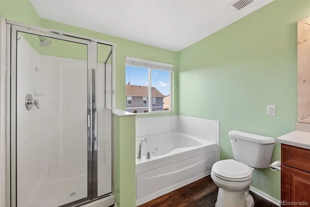 a view of a hallway with two rooms