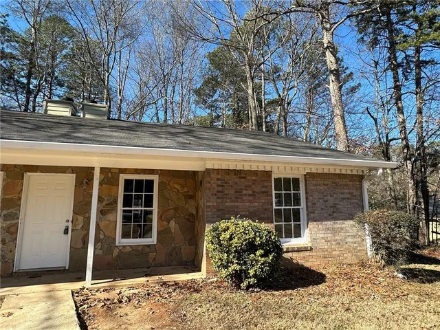 a front view of a house with patio