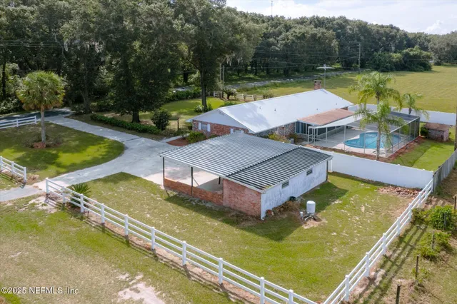 swimming pool view with a outdoor seating