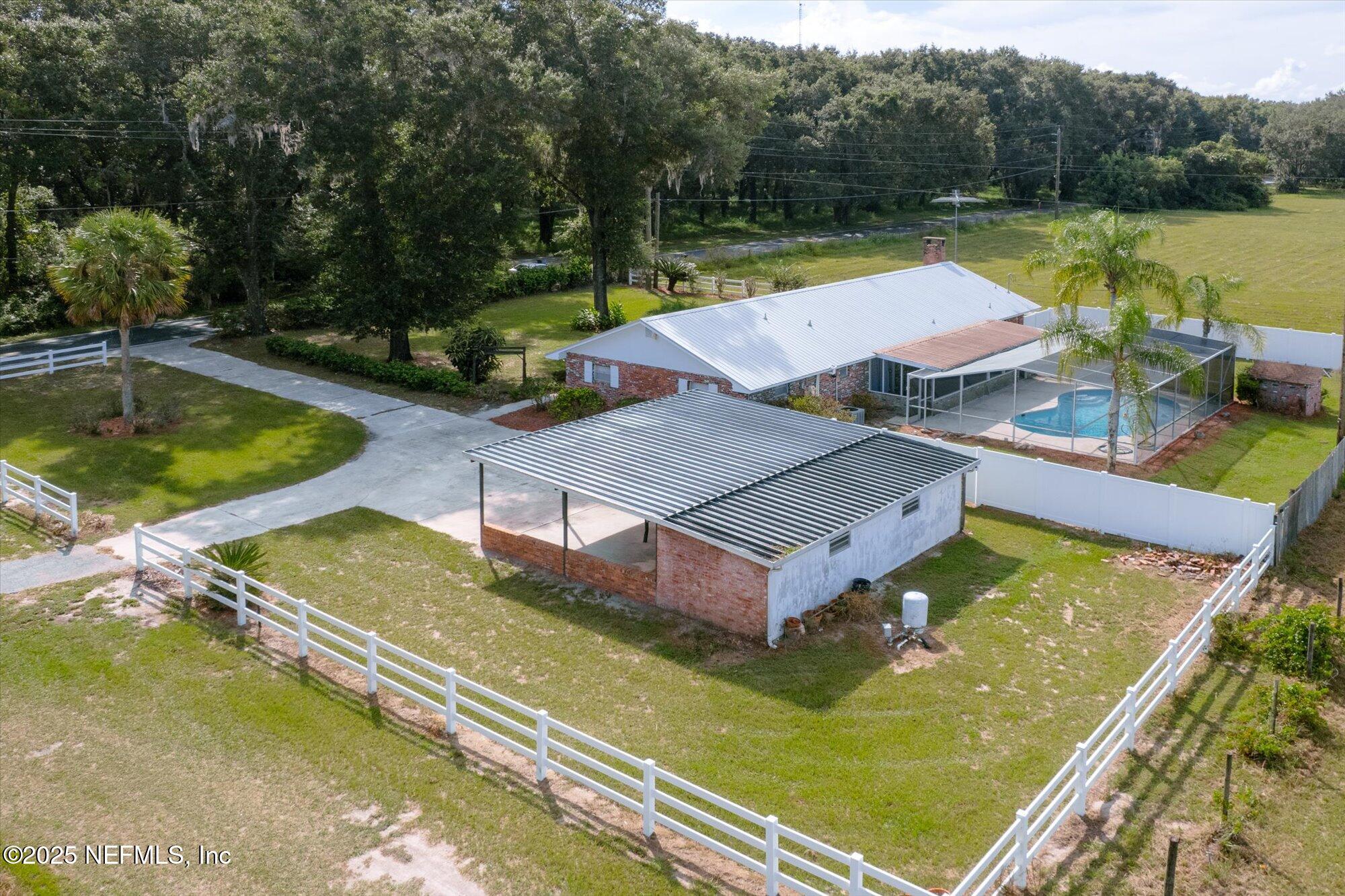 swimming pool view with a outdoor seating