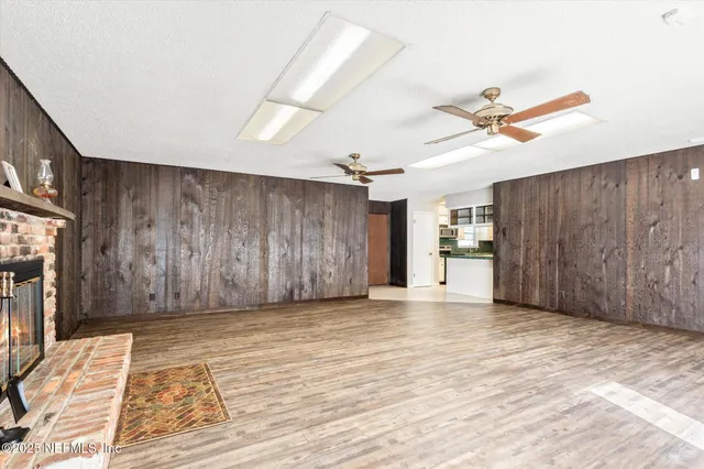a view of a livingroom with a fireplace