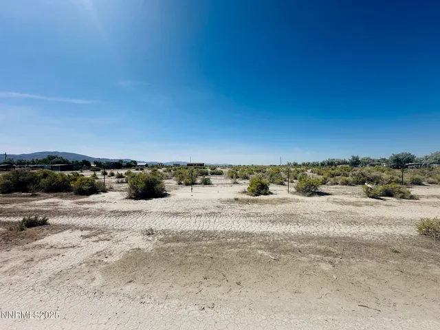 a view of beach and an ocean