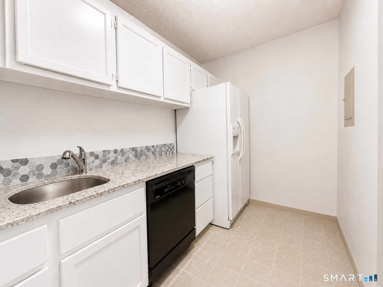 914 High Path Road, Unit 914 Windsor, CT 06095 - Photo 6 of 23 a kitchen with a sink and cabinets
