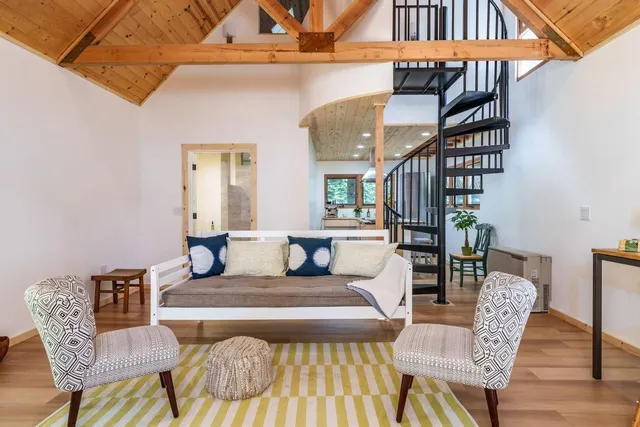 a kitchen that has a sink and a table in it