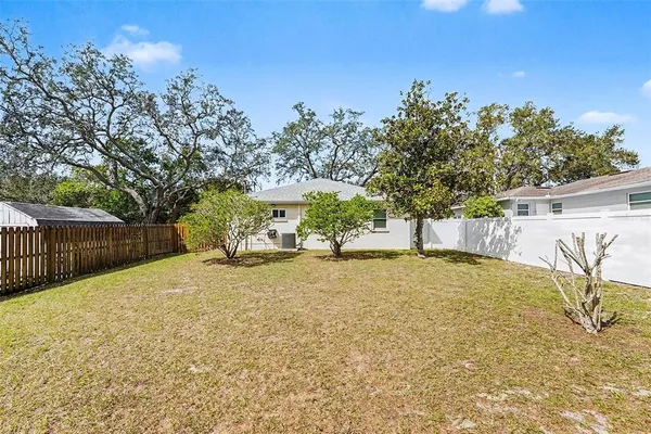 a house with trees in front of it