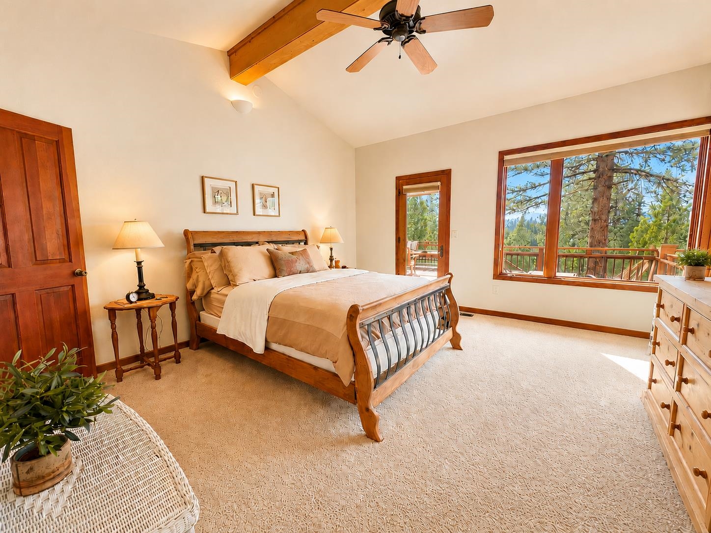 238 Clouds Rest Portola, CA 96122 - Photo 21 of 34 a bedroom with a bed lamp and a large window with the outer view