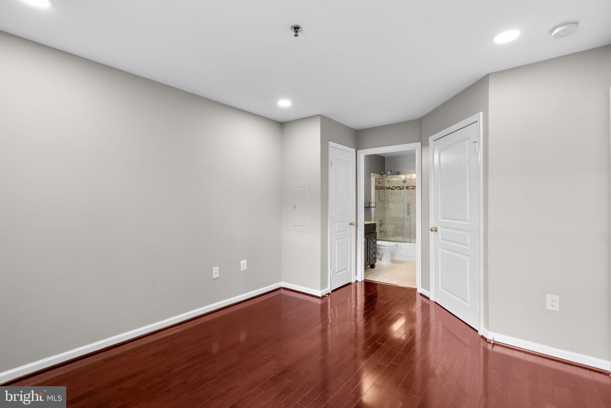 5563 Seminary Road, Unit 302 Falls Church, VA 22041 - Photo 20 of 30 a view of an empty room with wooden floor
