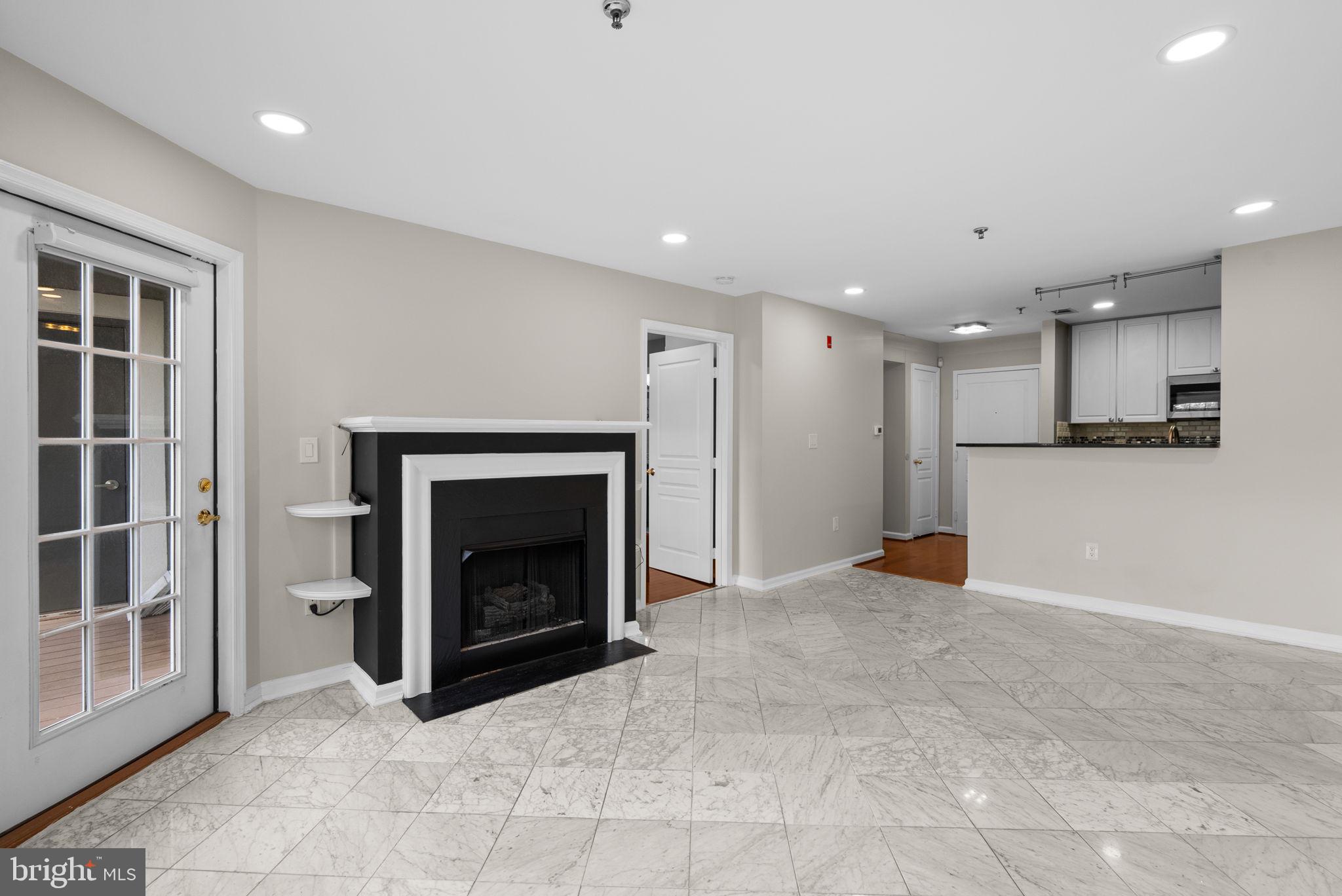 5563 Seminary Road, Unit 302 Falls Church, VA 22041 - Photo 9 of 30 a view of an empty room with a fireplace