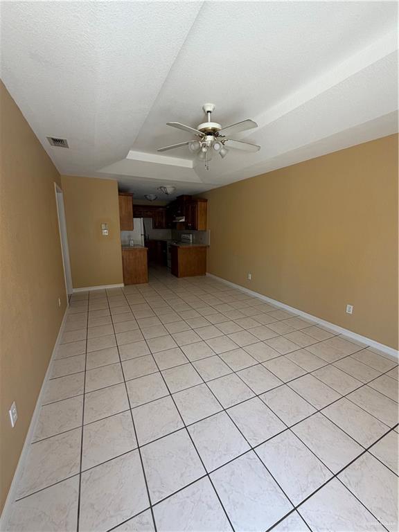 4006 Inspiration Road, Unit 3 Mission, TX 78573 - Photo 5 of 10 a view of an empty room with a window