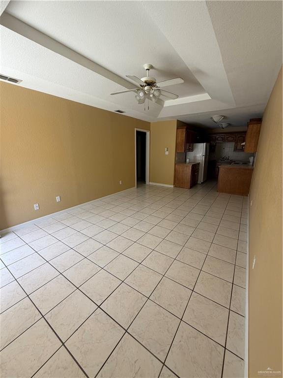 4006 Inspiration Road, Unit 3 Mission, TX 78573 - Photo 6 of 10 a view of a livingroom and a chandelier fan
