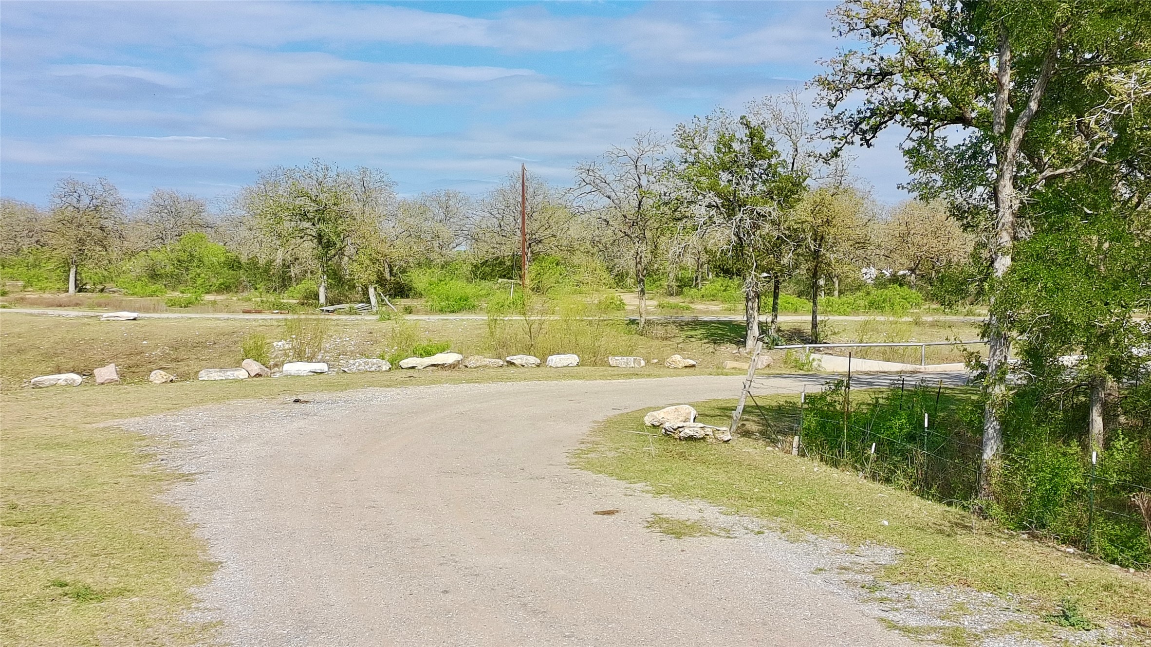 9024 Lockwood Springs Road Manor, TX 78653 - Photo 18 of 25 a view of an outdoor space and a yard