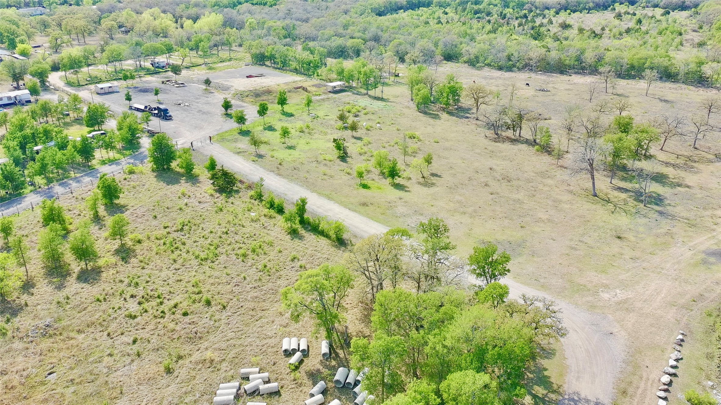 9024 Lockwood Springs Road Manor, TX 78653 - Photo 23 of 25 an aerial view of a beach with a yard