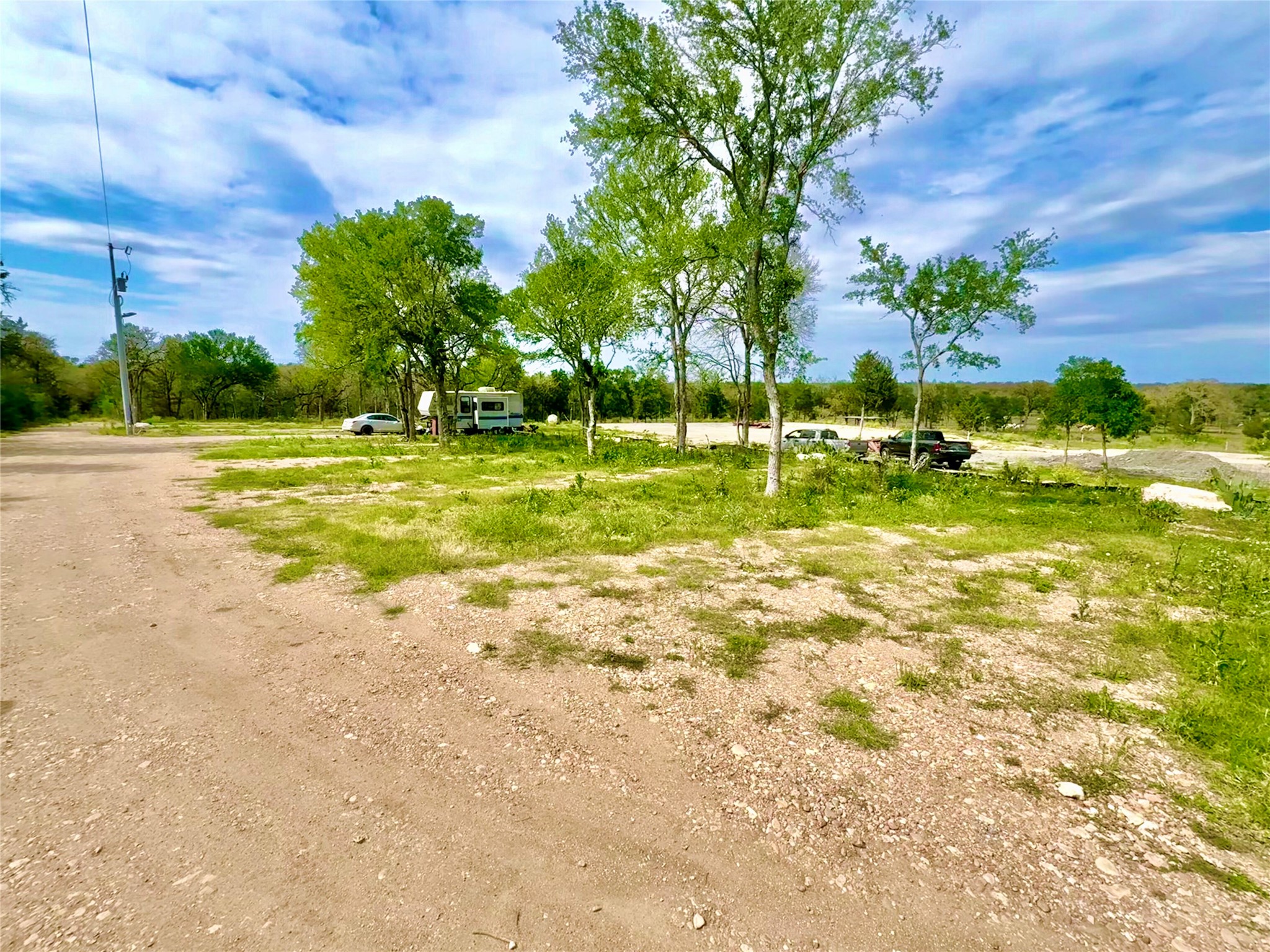 9024 Lockwood Springs Road Manor, TX 78653 - Photo 4 of 25 a view of a swimming pool and a yard